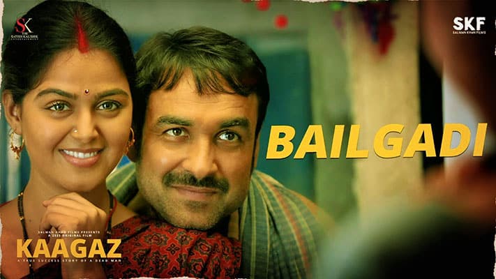 Bailgadi Lyrics Translation – Kaagaz | by Udit Narayan & Alka Yagnik
