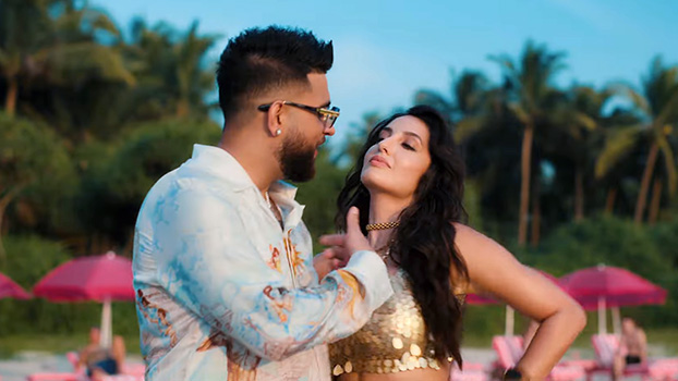 Karan Aujla’s Aaye Haaye Lyrics English {Meaning} Neha Kakkar | Ft. Nora Fatehi