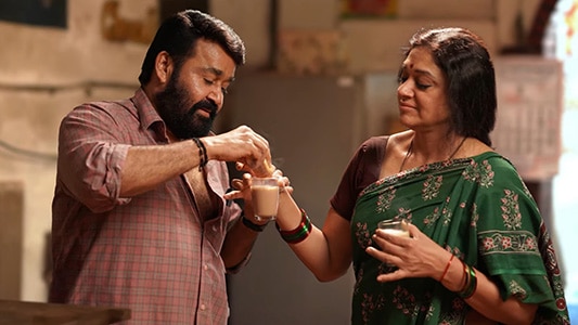 Thudarum Kanmanipoove lyrics english Mohanlal Shobana
